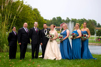 posed with bridal party